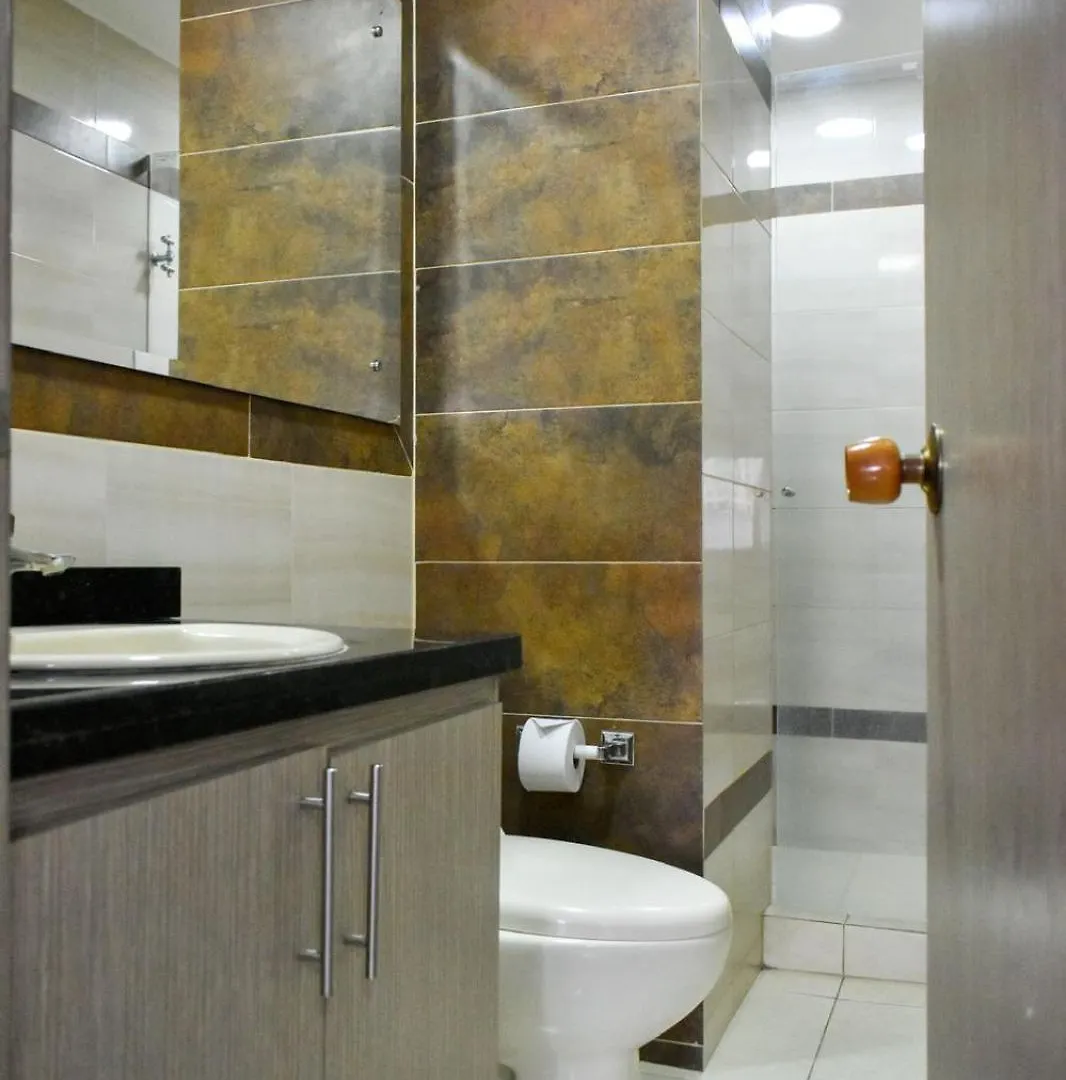Suites Flora Deluxe Av 5 Cali Hotel